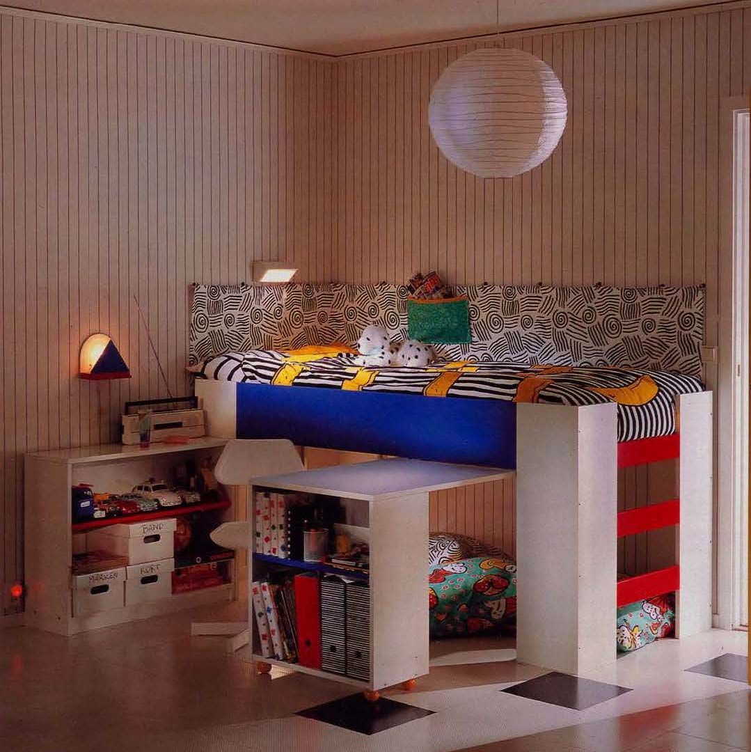 The 1990 IKEA catalogue showing a children's elevated bed with drawers and mobile modultes underneath.