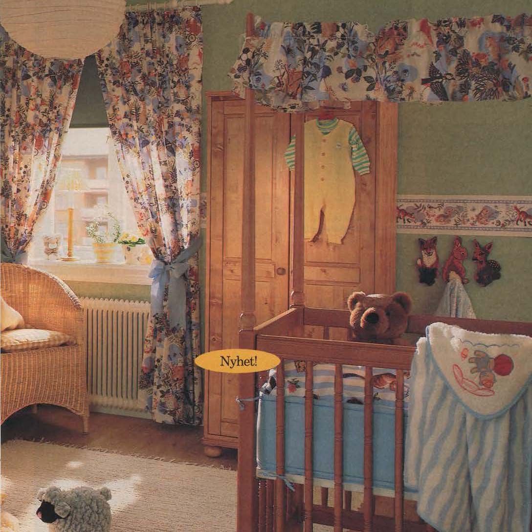 The 1996 IKEA catalogue showing a nursery with floral curtains and fabrics, a four-poster wood cot and a wooden wardrobe next to a window.