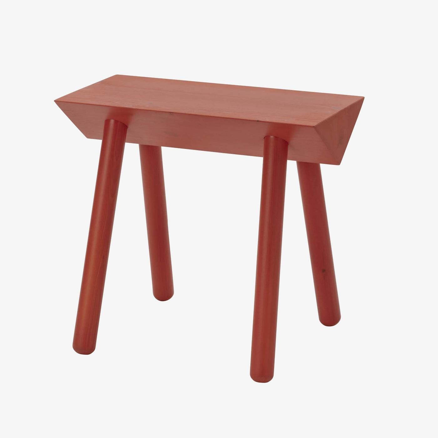 A red OMMJÄNGE stool.