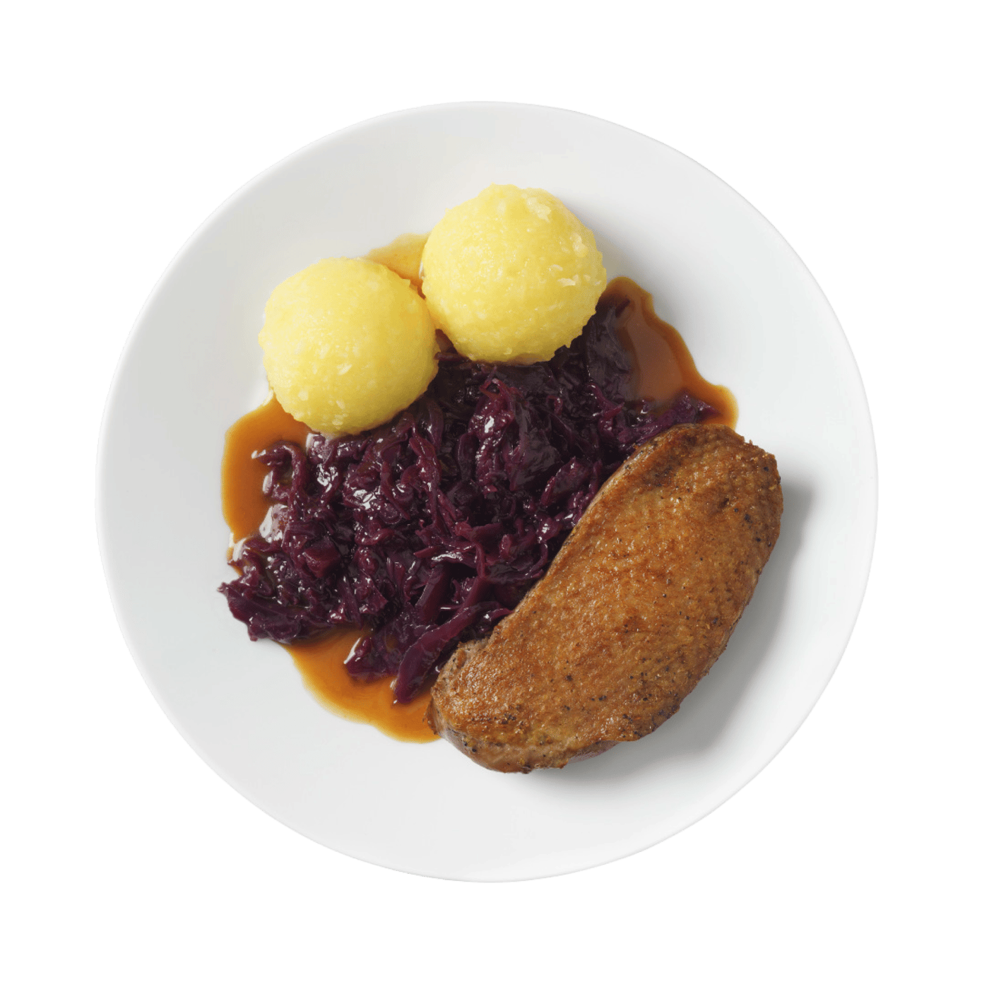 A plate with two scoops of mashed potato, red cabbage, duck breast and gravy.
