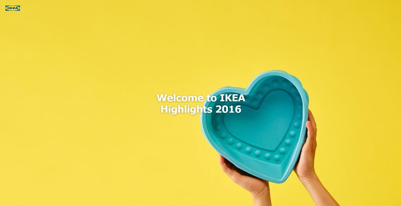 Hands holding a cake mold in the shape of a heart against a yellow background.