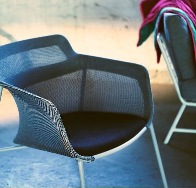 A blue chair on a blue floor