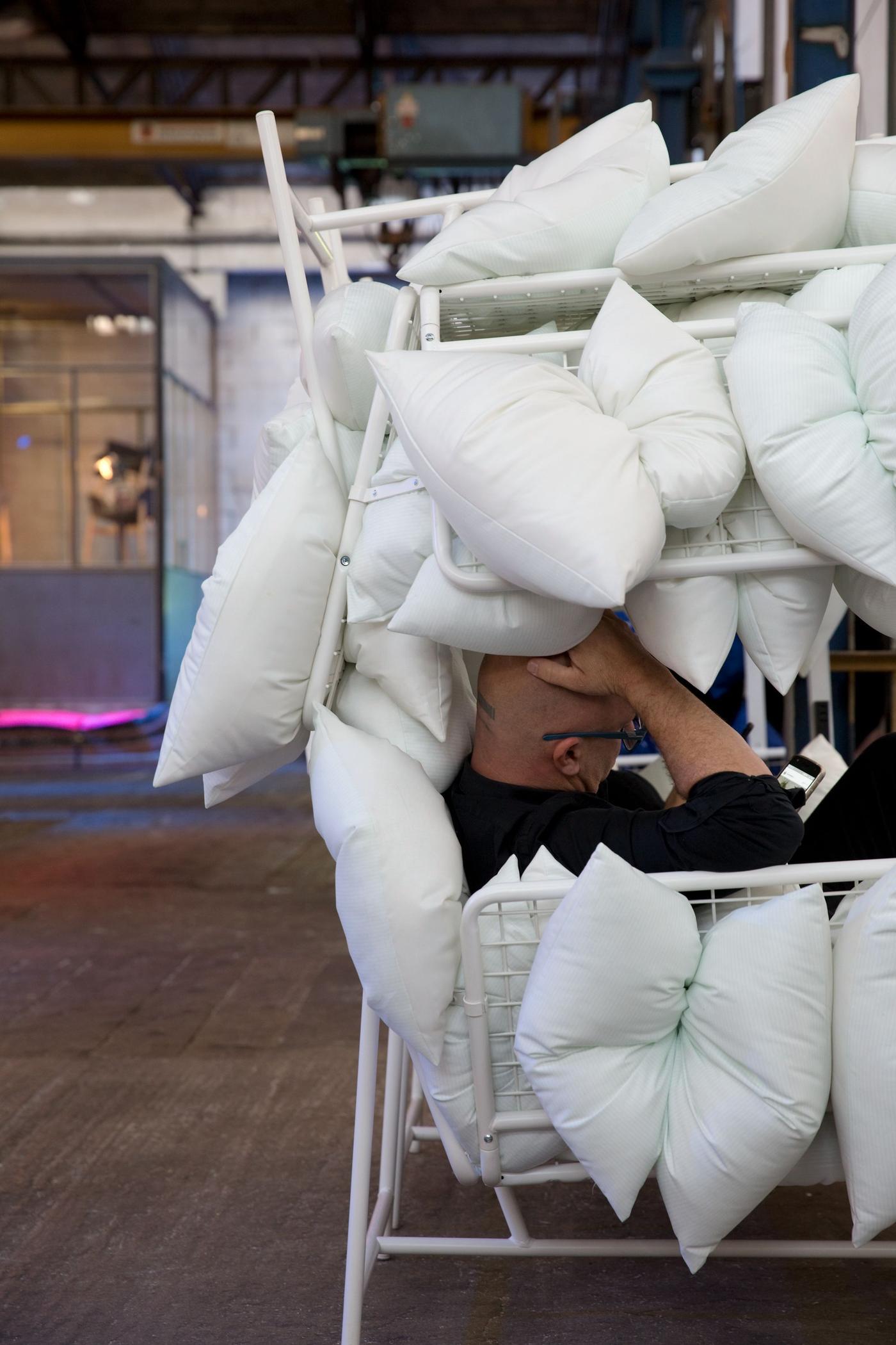 A display of white cushions.