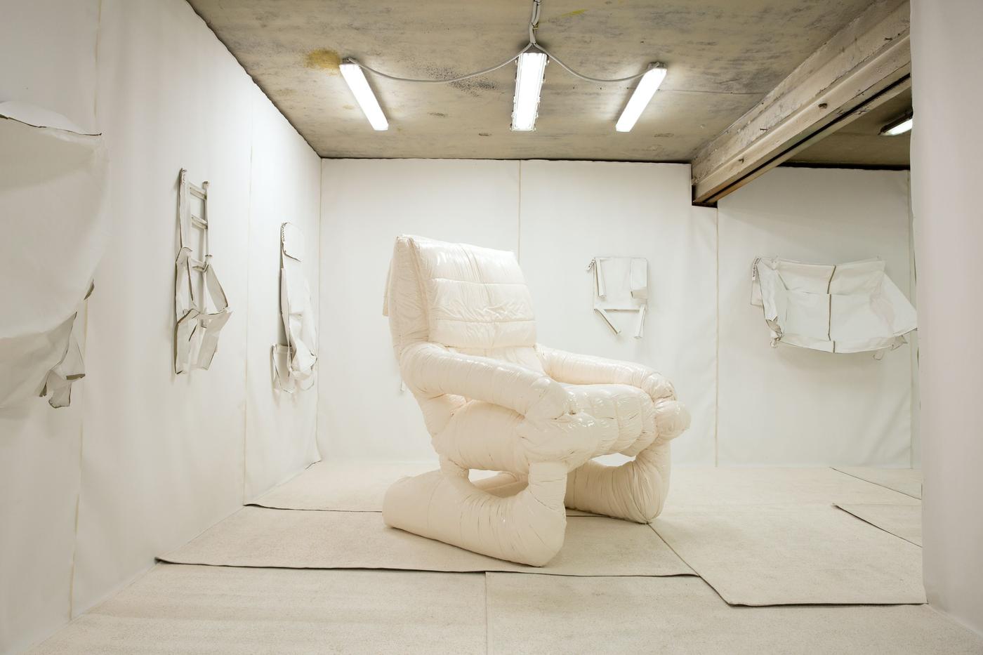 A display of a big white puffy chair.