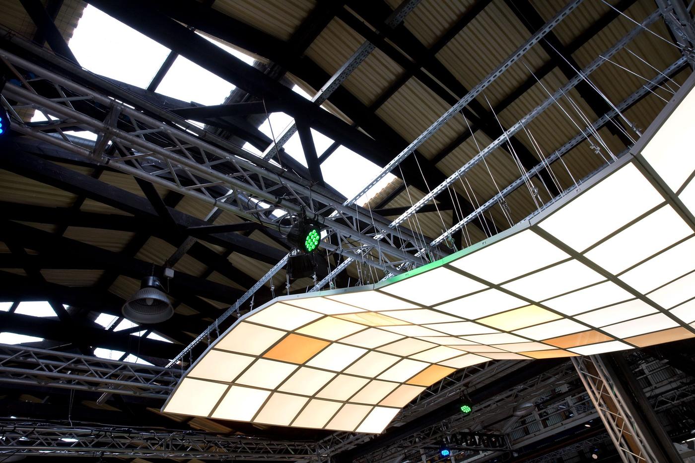 Scaffolding and lighting in an event setting.