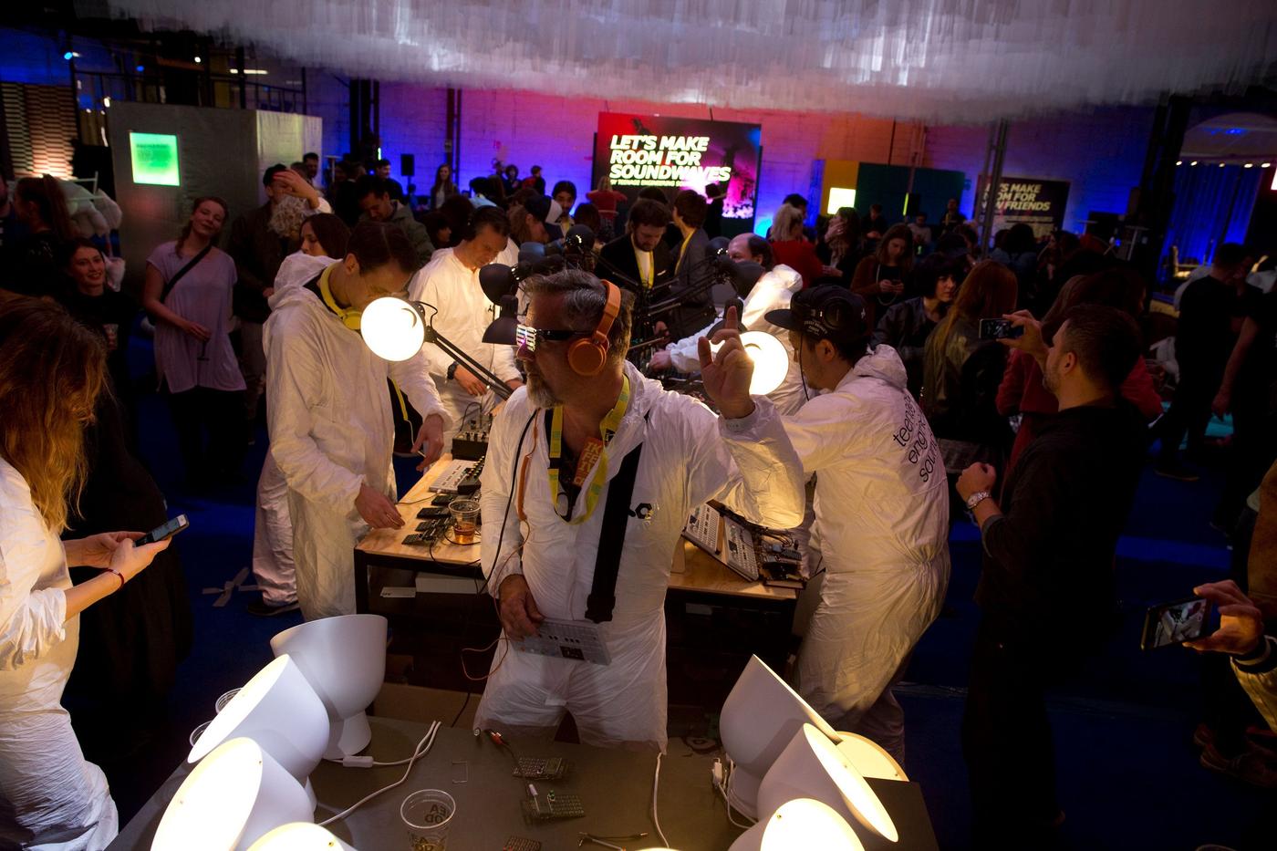 A large group of people in an event setting.