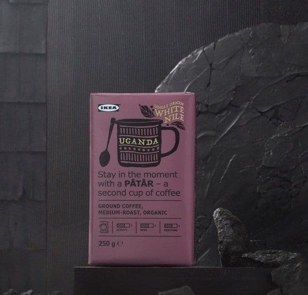 A packet of coffee against a dark background.