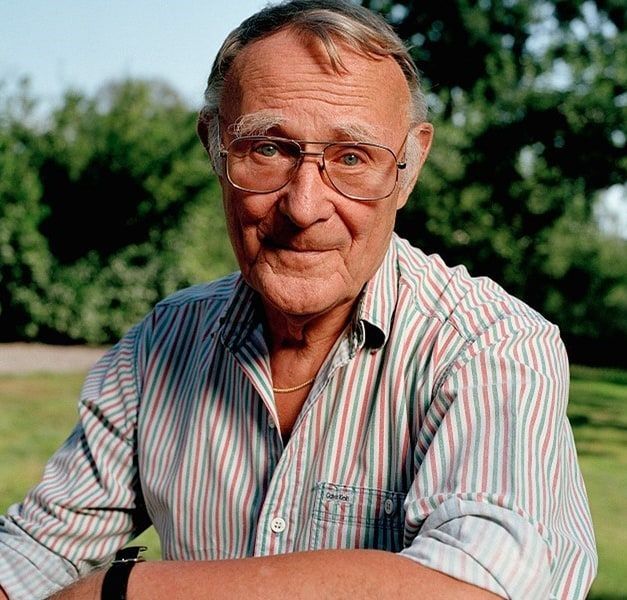 Portrait of Ingvar Kamprad seated outdoors.
