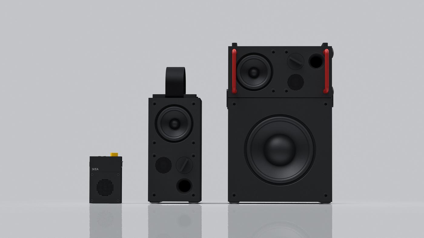Three speakers: A small, medium and large speaker in black and red.