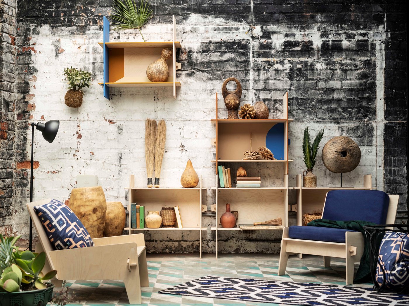 Living room furnished with products from the IKEA ÖVERALLT collection.
