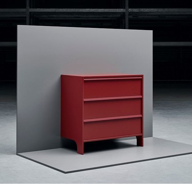 Red chest of drawers displayed against a grey background.