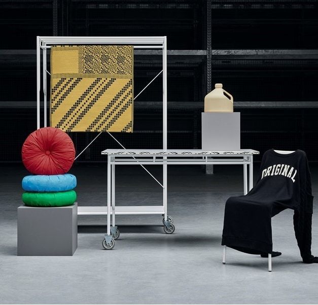 SAMMANKOPPLA collection products displayed in dark, dramatically lit studio space.