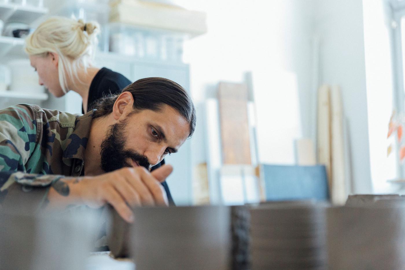 People working on designing scented candles.