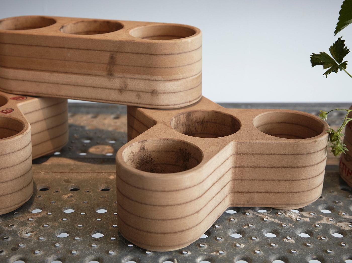 Prototypes in different shapes on a metal surface.