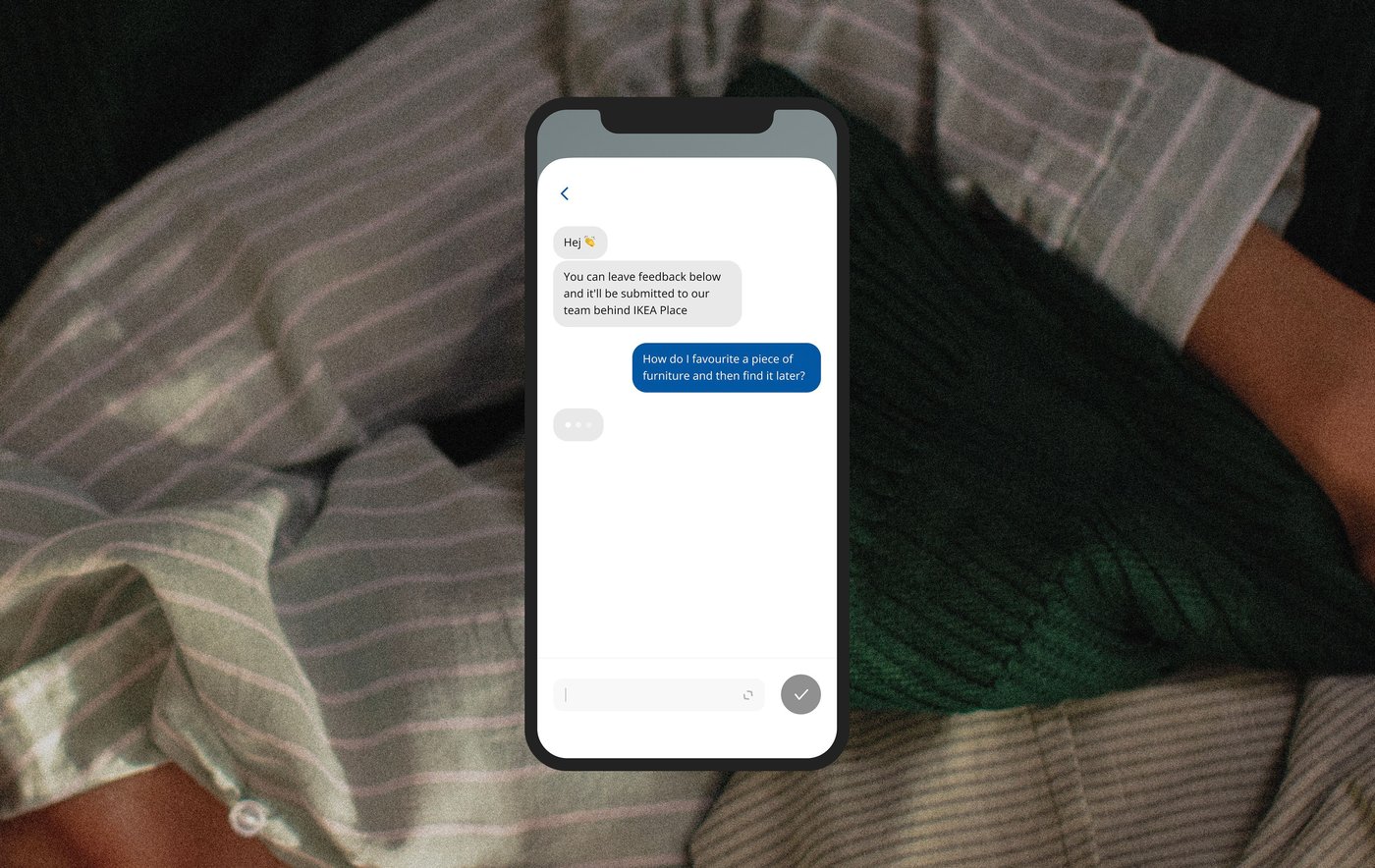 Photo of a person lying down with a knitted throw, overlaid with a smartphone screen showing a text message conversation