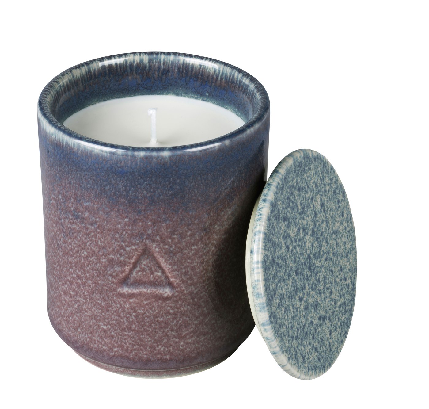 A blue and purple ceramic handle holder with a candle inside. Against a white background.