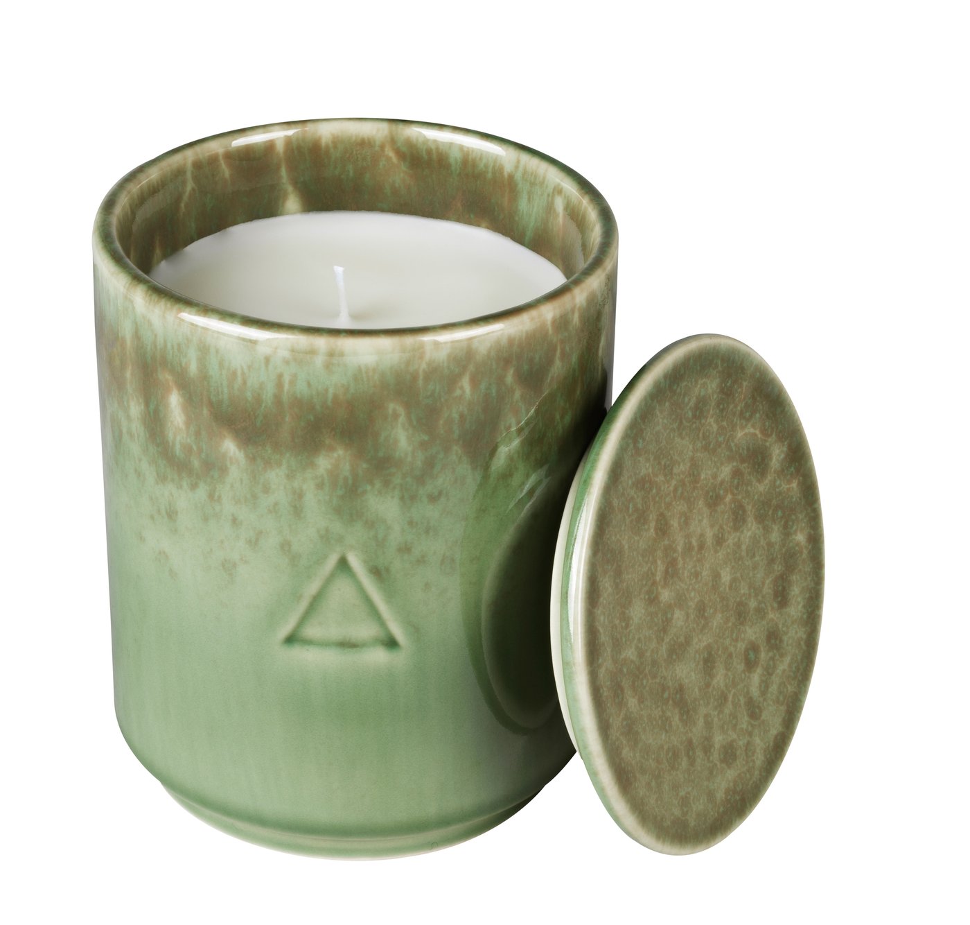 A green ceramic handle holder with a candle inside. Against a white background.