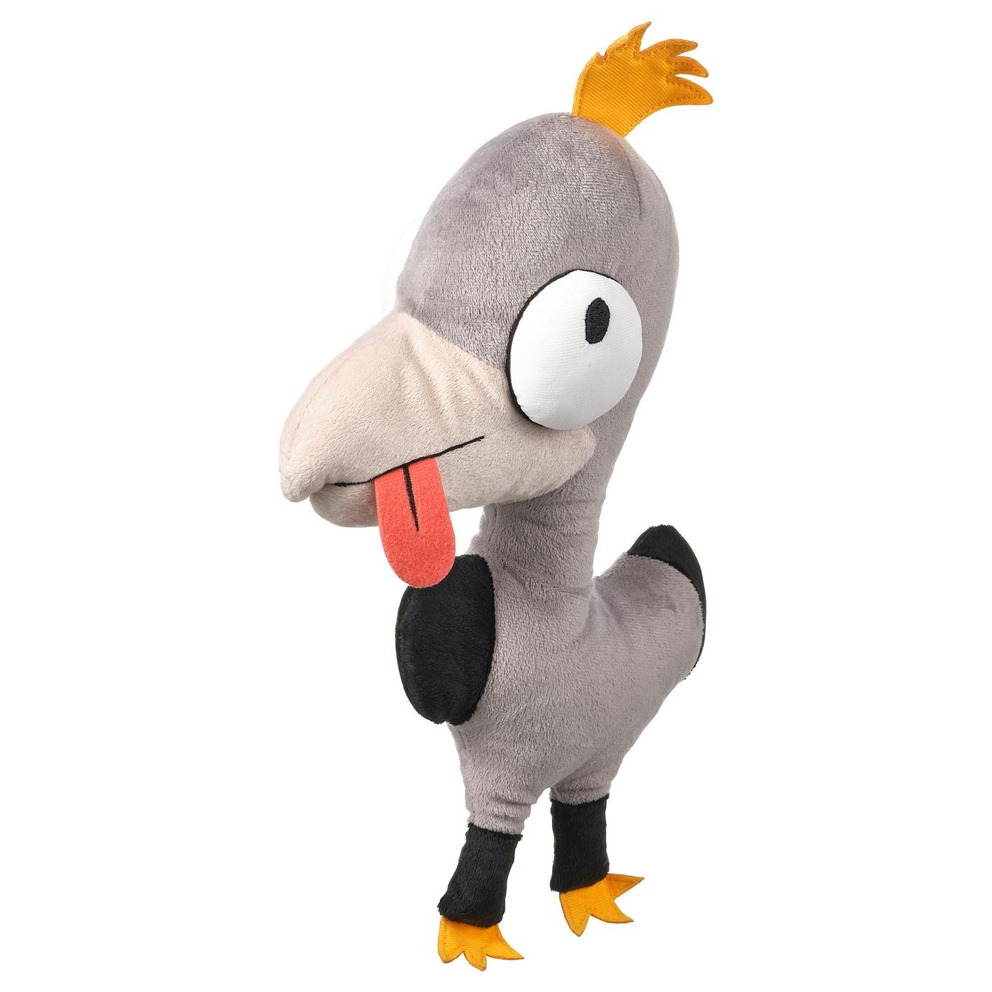 A grey bird with yellow hair looks sideways. It sticks out its tongue.