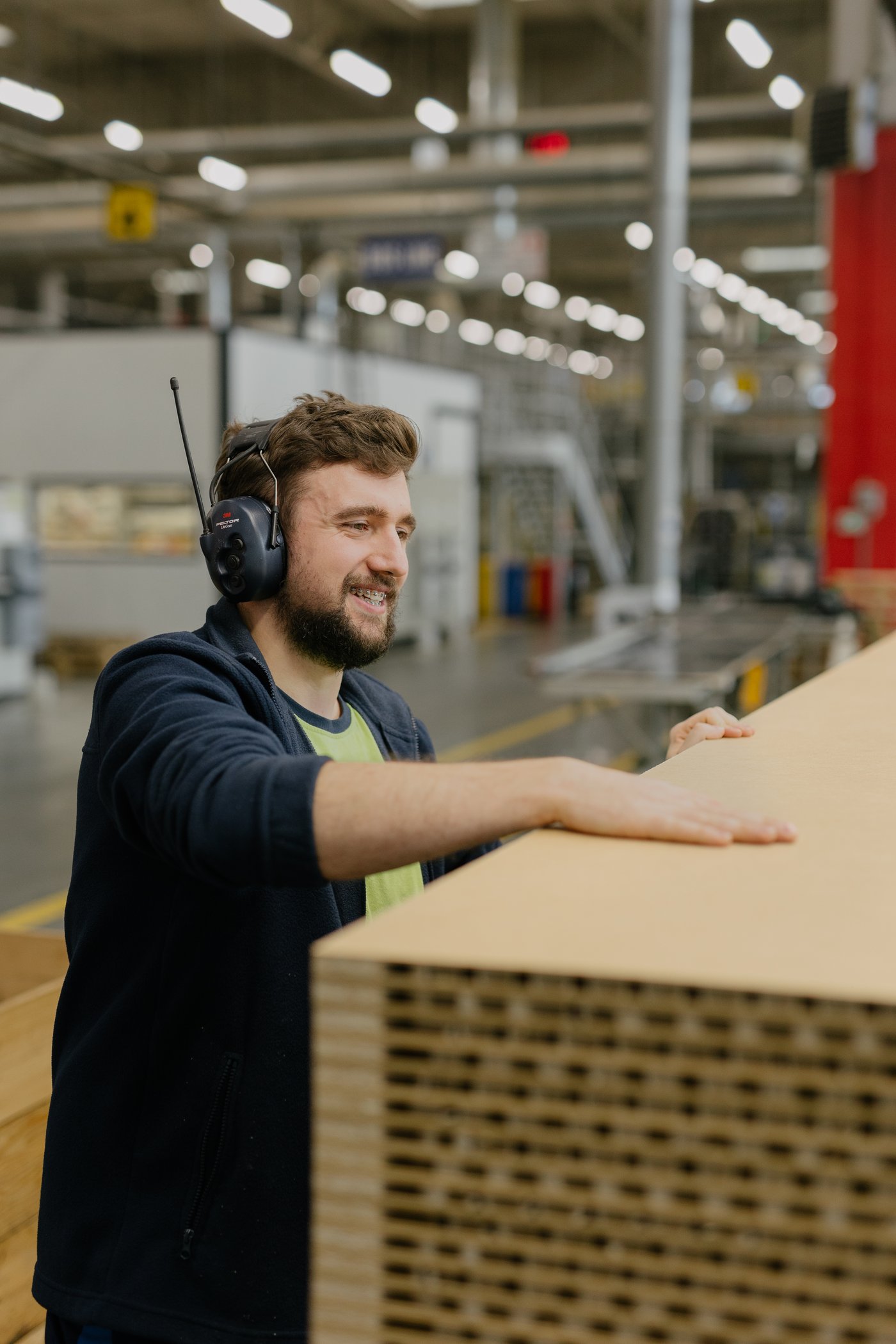 A person inspects material in an IKEA Industry factory in Zbaszynek.