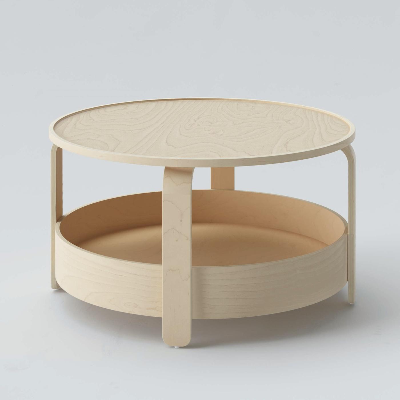 A round, light wood BORGEBY table.