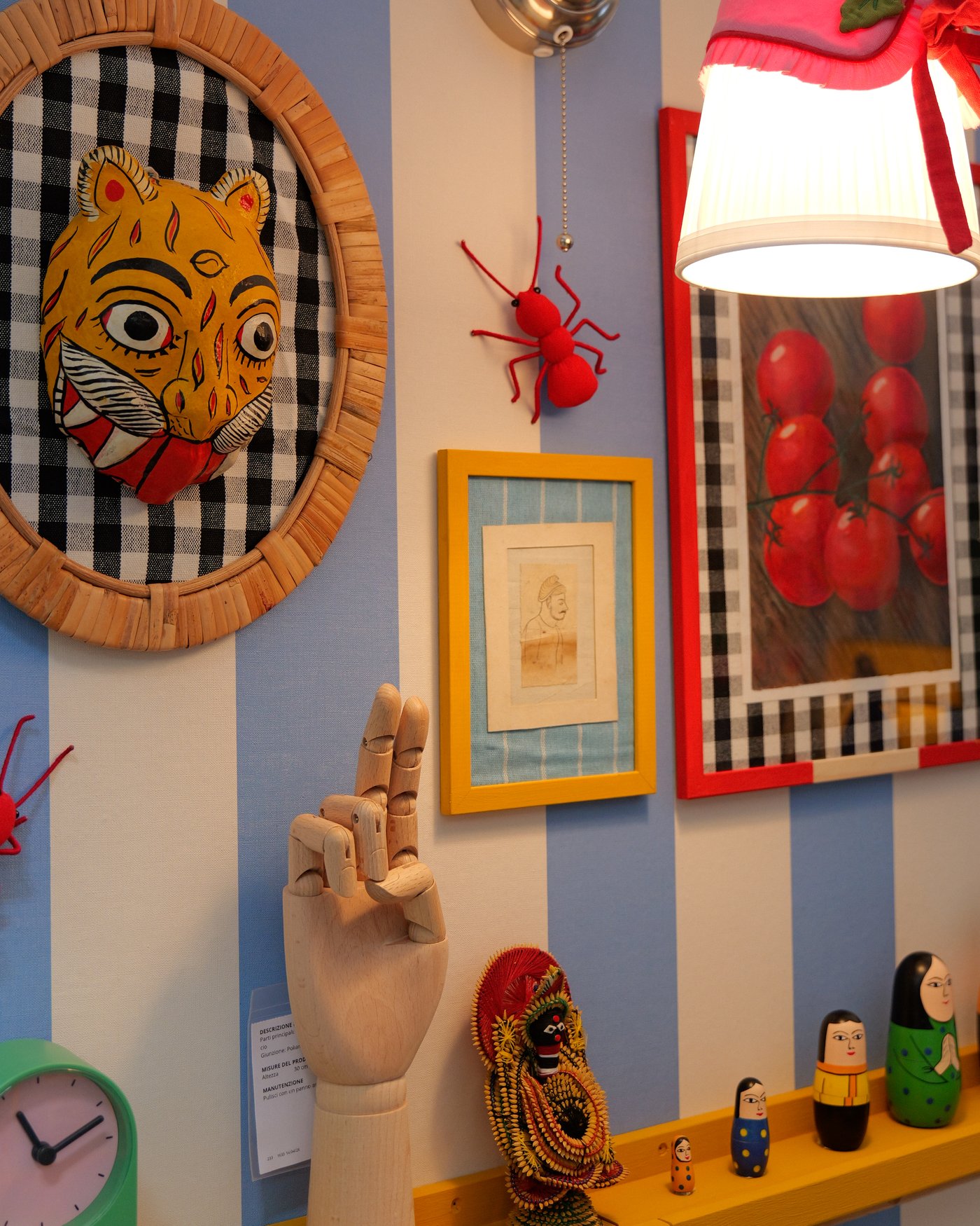 A decorated blue and white striped wall.