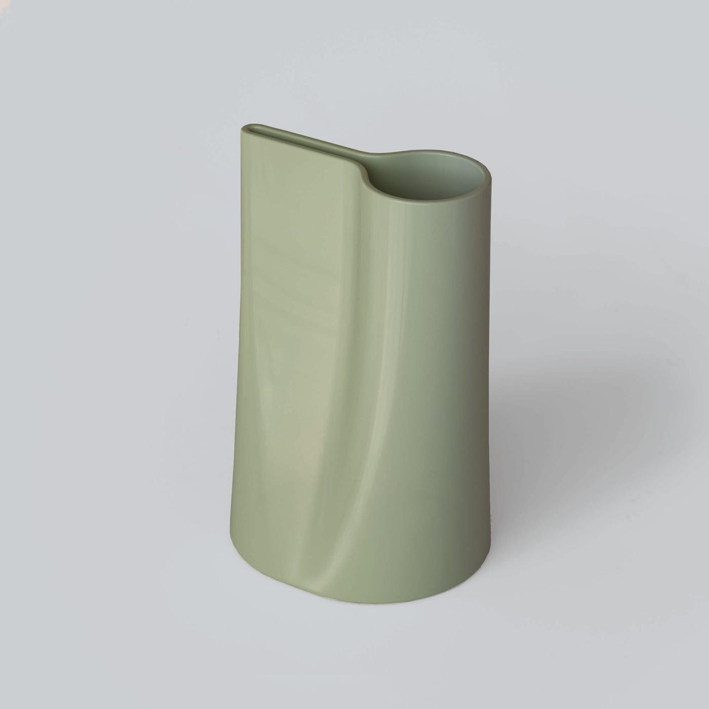 A pale green CHILFRUKT watering can / vase.