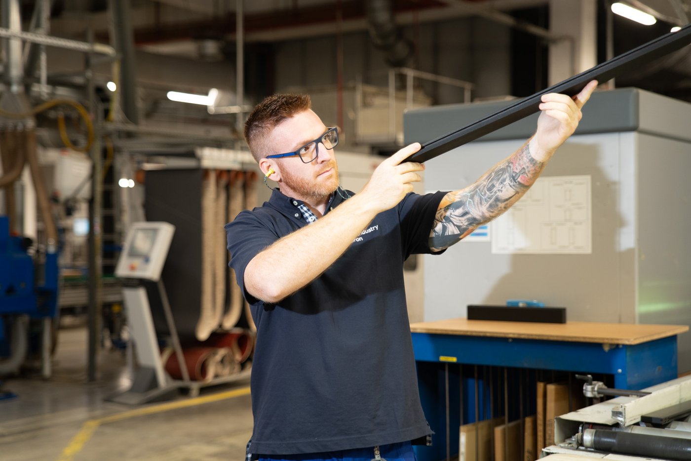 A person inspects material in an IKEA Industry factory in Sopron.