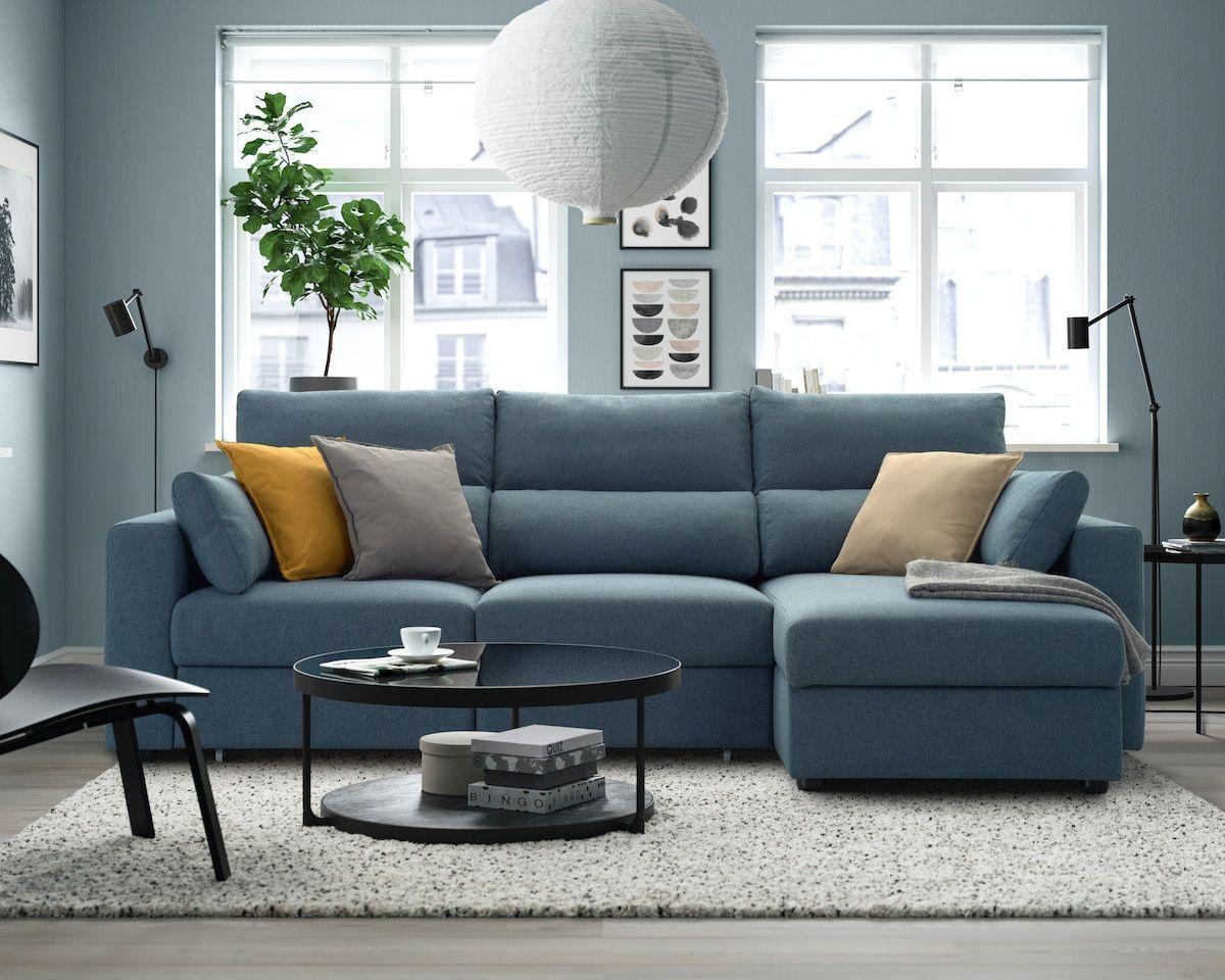A blue ESKILSTUNA sofa in a blue living room.