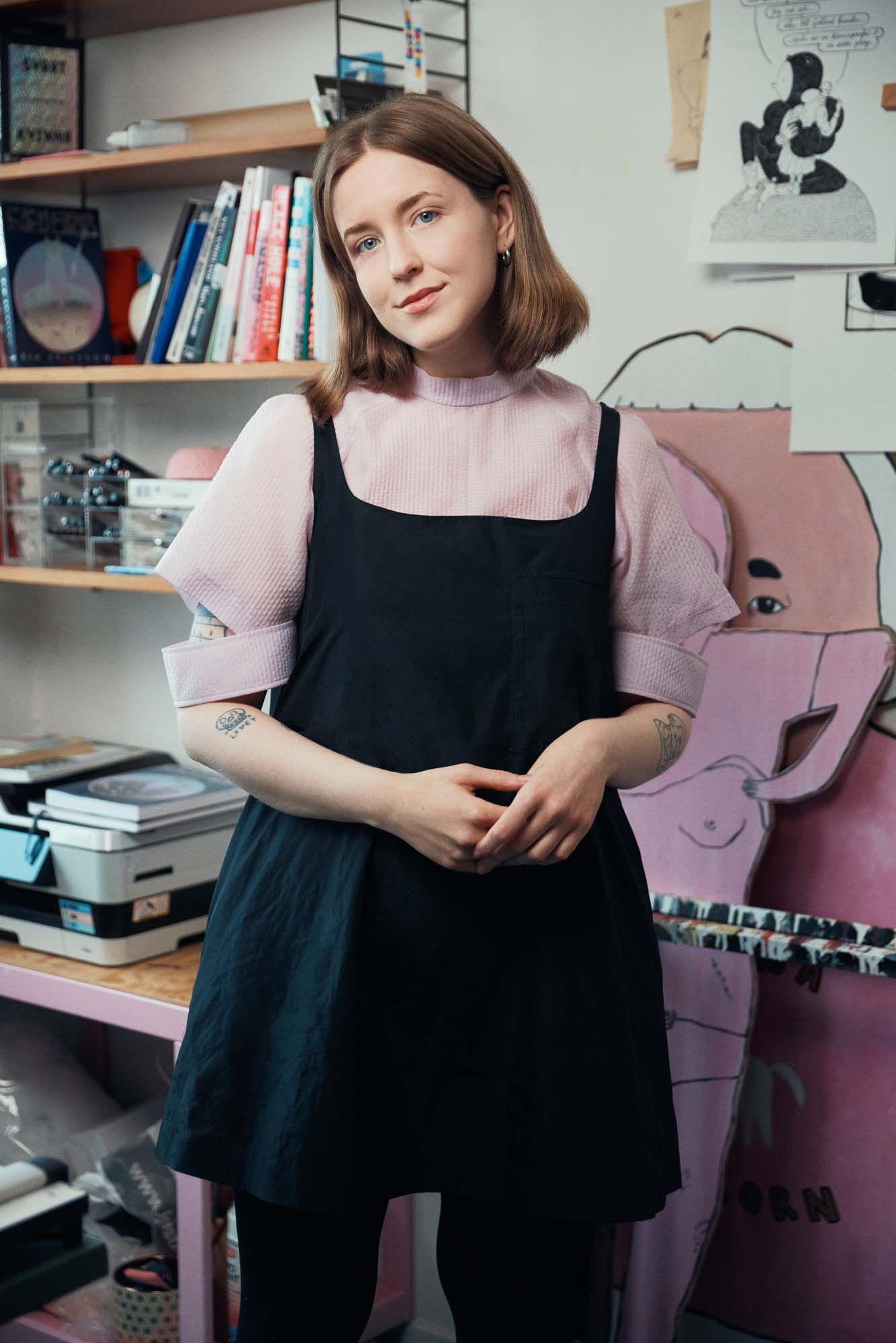 Portrait of Bim Eriksson standing in her studio.