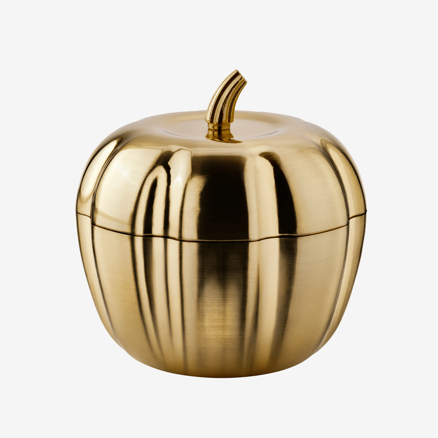 A gold pumpkin-shaped HÖSTAGILLE scented candle against a light grey background.
