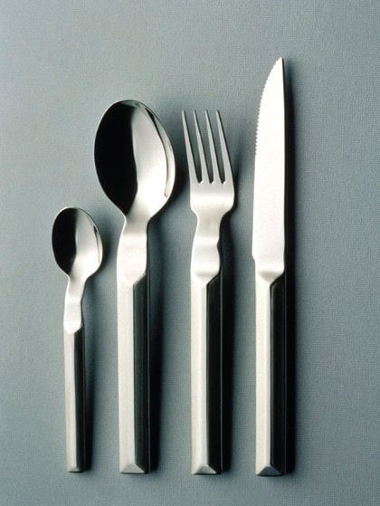 Cutlery set on a grey background.