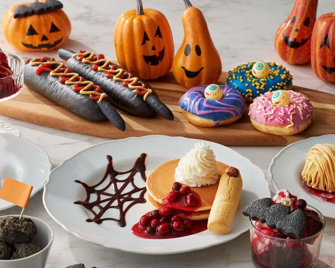 A table spread with festive, halloween-inspired food from IKEA Japan.