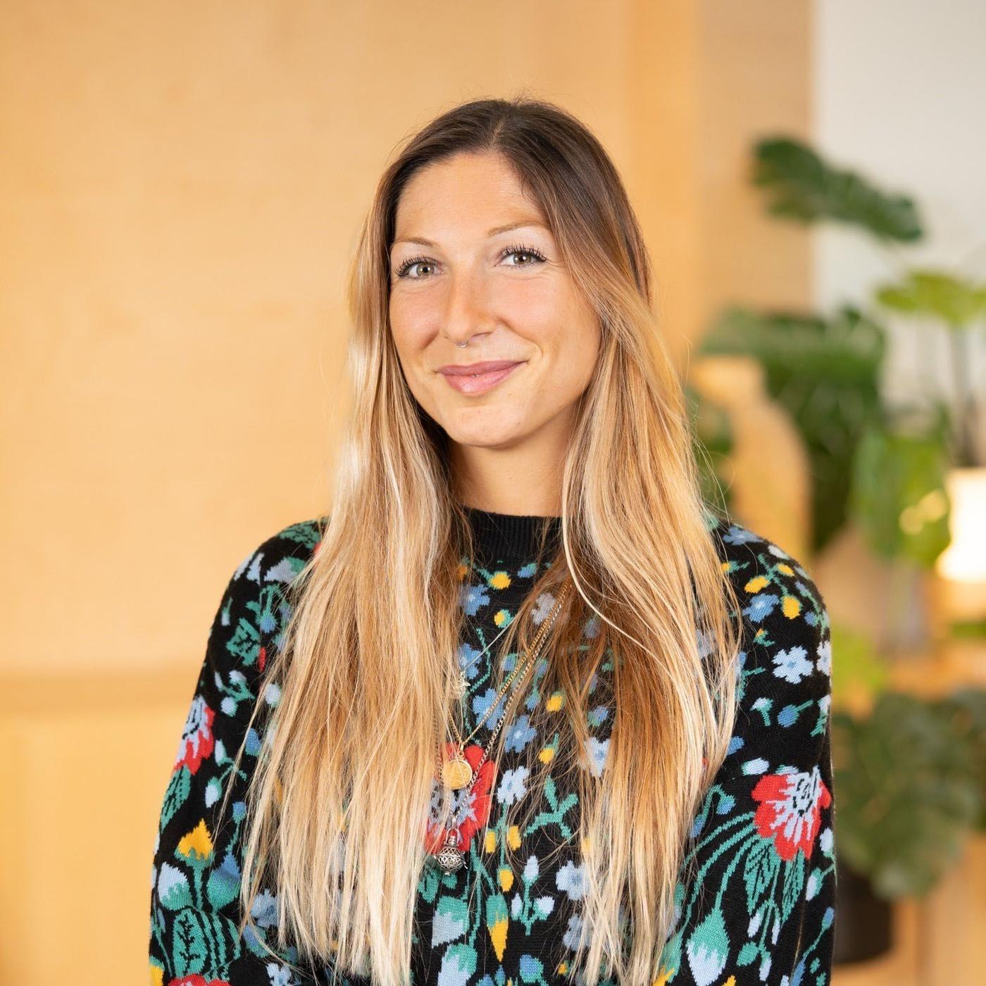 IKEA co-worker Catarina smiles at the camera.