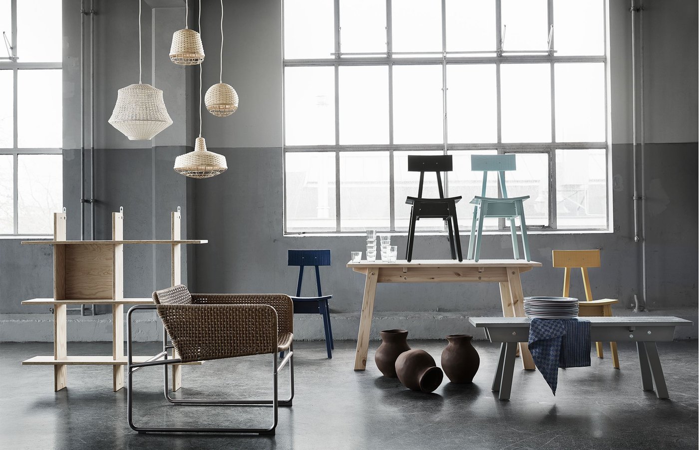 Various pieces of furniture in muted tones from the INDUSTRIELL collection by Dutch designer Piet Hein Eek and IKEA.