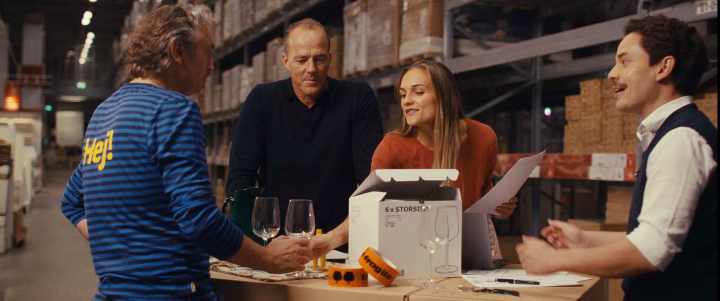 IKEA International Sales co-workers curating products for an order in an IKEA warehouse.