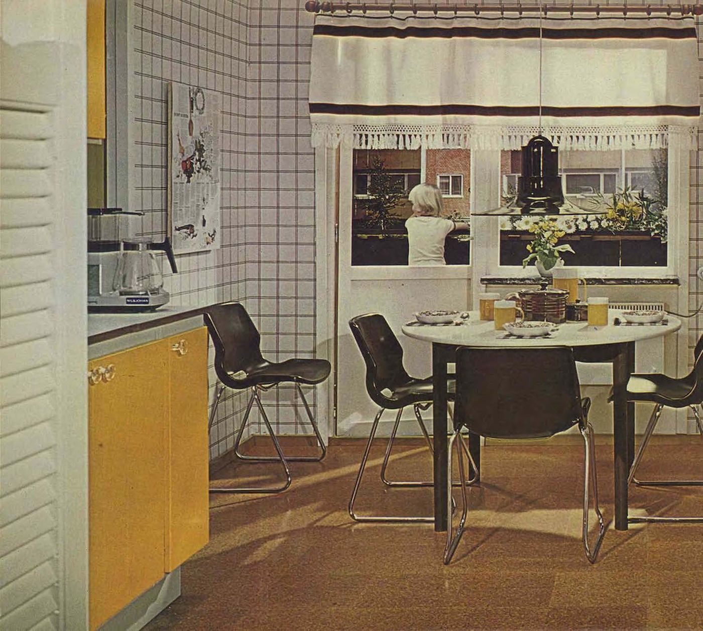 A yellow and check kitchen from the 1973 IKEA catalogue