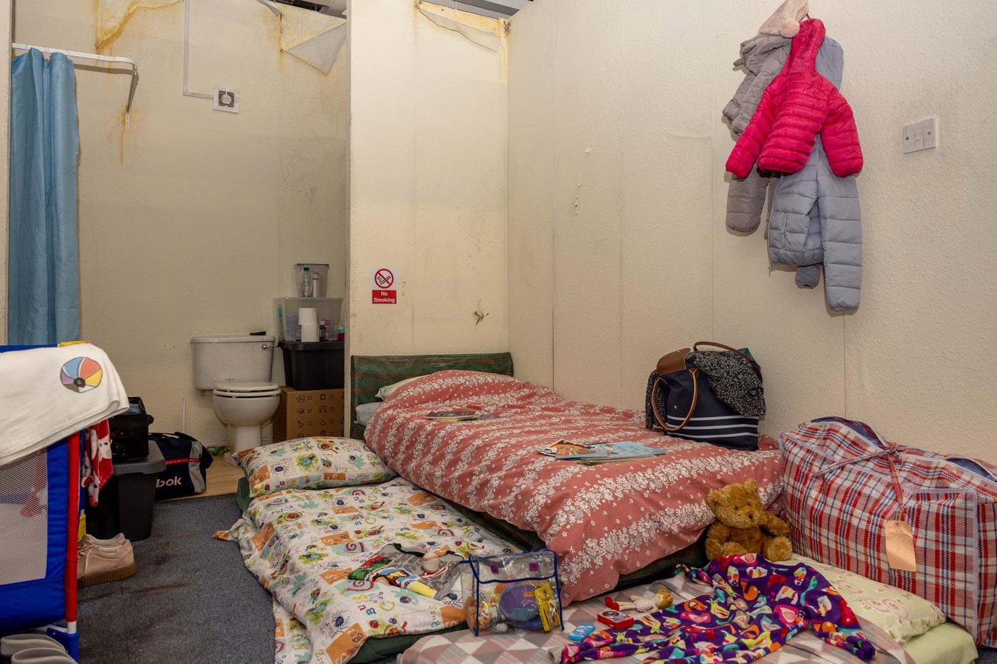 Three beds tightly packed together in the Birmingham store's real-life roomset.