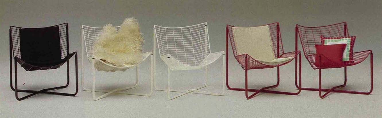 A vintage image from the 1984 IKEA catalogue featuring a row of JÄRPEN chairs in different colours.