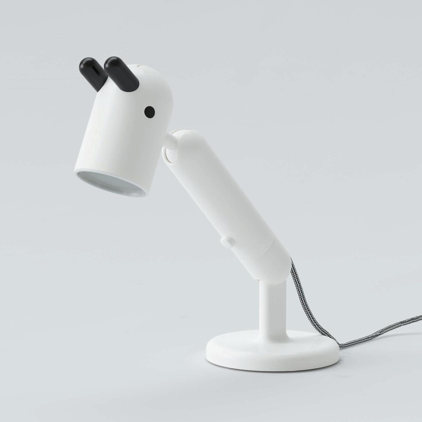 A white KRUX lamp.