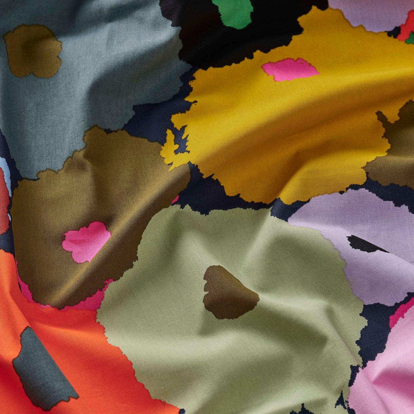 A close-up image of a piece of MURREVA fabric, wrinkled.