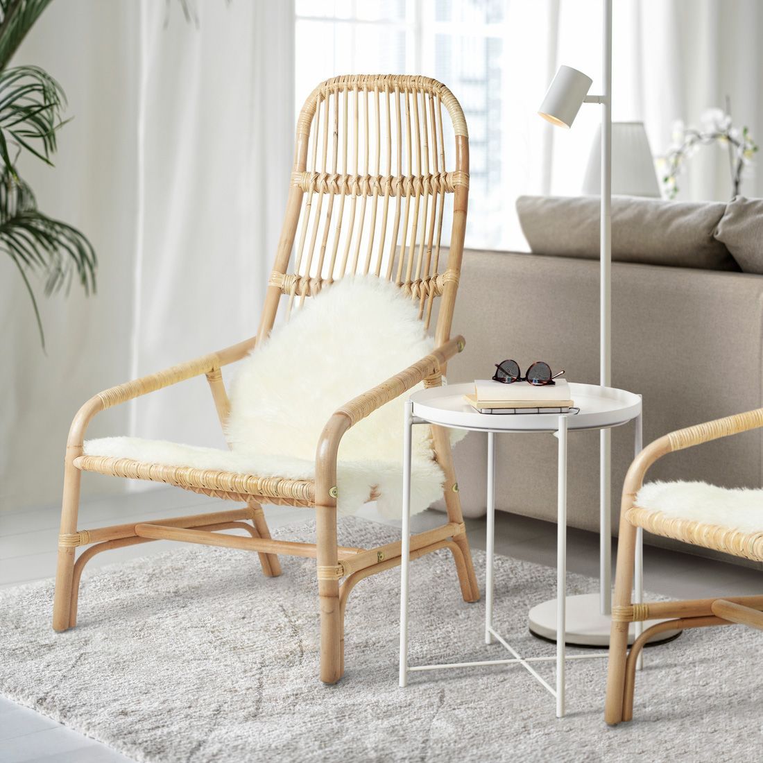 A SALNÖ armchair in a light, neutral-toned living room.