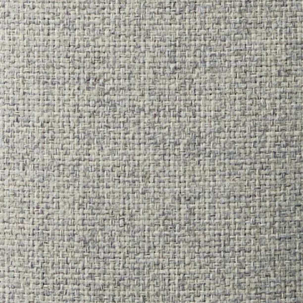 A close-up of grey, textured fabric.