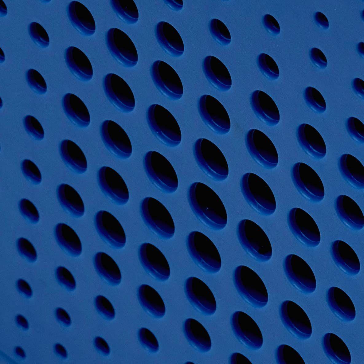 Close-up of the front of a blue VAPPEBY speaker.