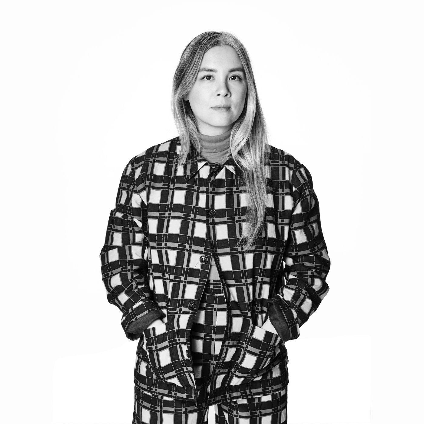 A black and white portrait of designer Evelina Kroon.