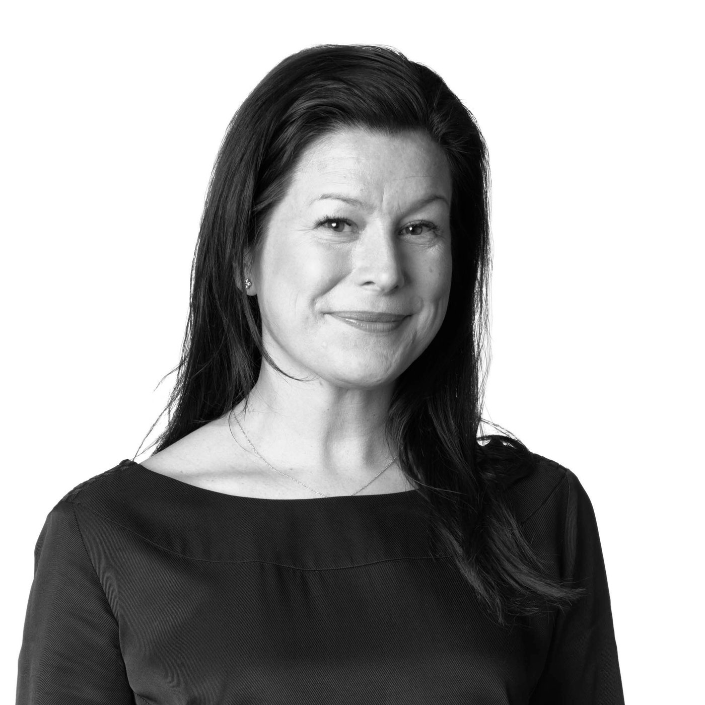 A black-and-white portrait of designer Lisa Hilland.