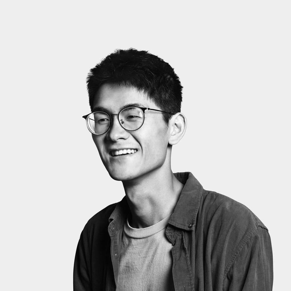 Black and white portrait of designer Zhelin Lian.