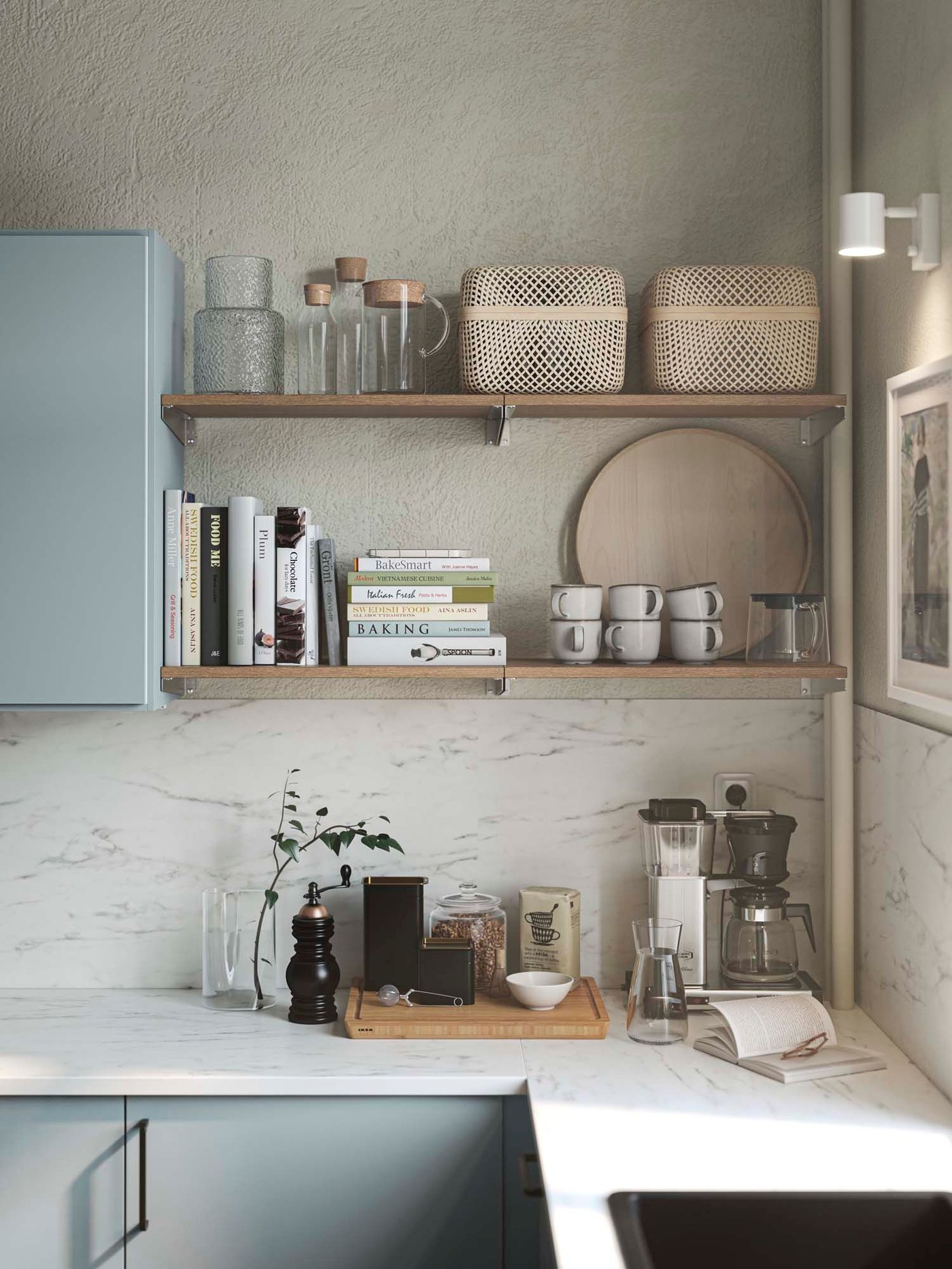 A pale kitchen with bottles and jars on the counter and two shelves stacked with boxes and jars.
