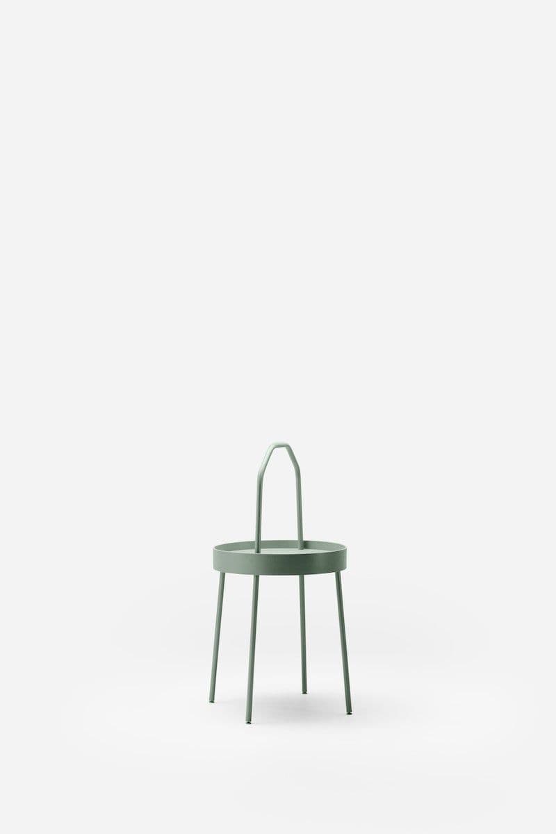 A green BURVIK side table on a white infinity backdrop.