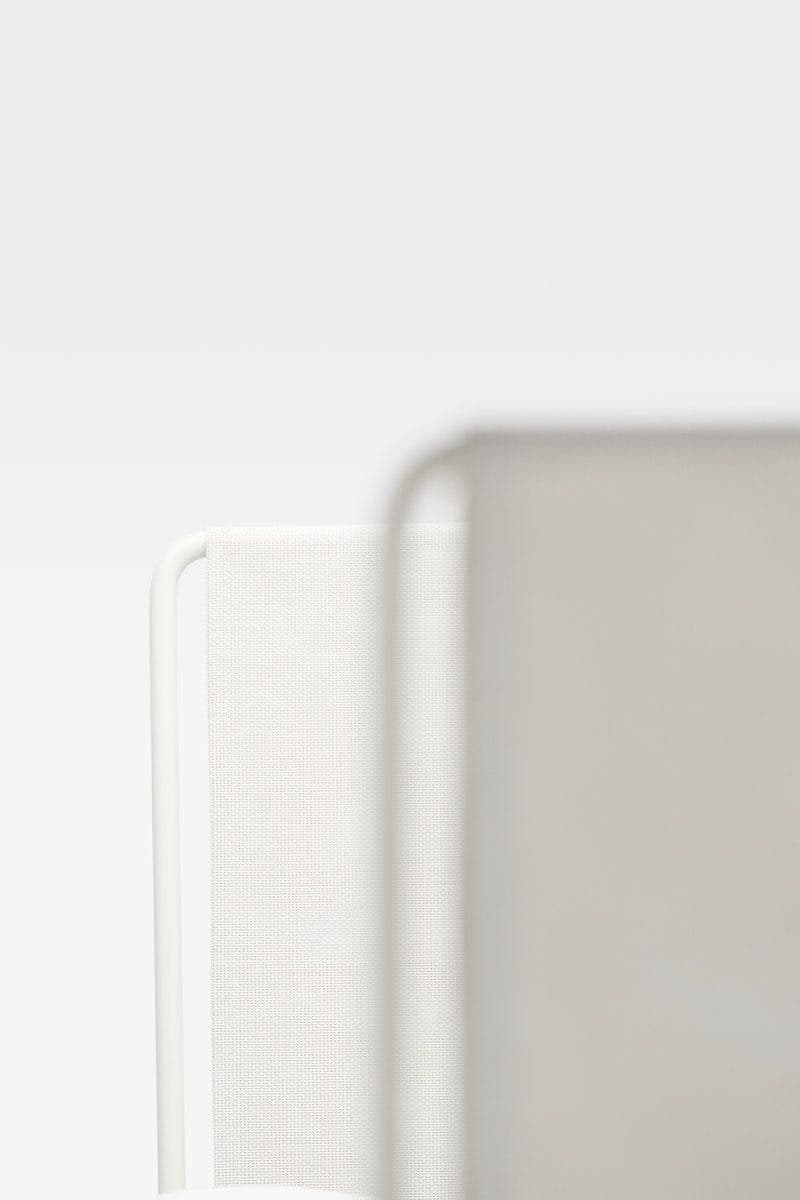 Close-up details of the HAVSTEN armchair's metal frame.