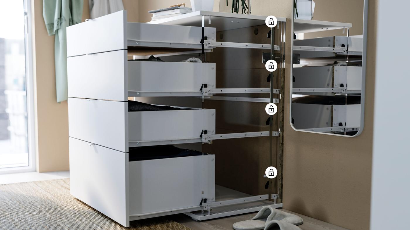 A zoom in picture showing a chest of drawers in white color illustrating the Anchor and Unlock mechanism.
